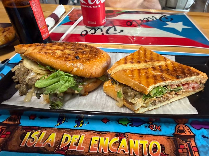 This Georgia Puerto Rican Kitchen Serves Crispy Pork, Tostones, And Island Comfort Food - Decor Hint The Jibarito And Friends On The Sandwich Board