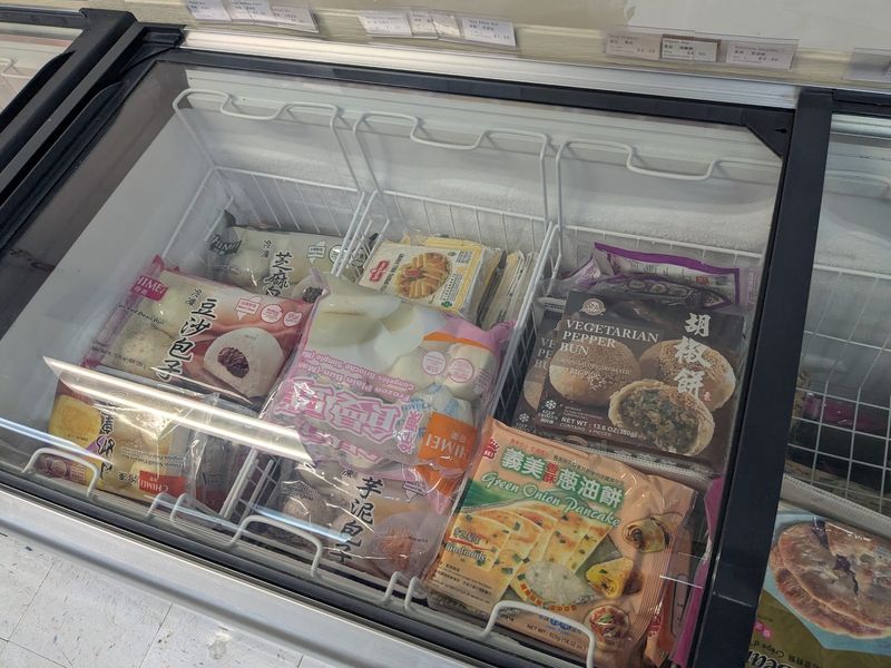 Freezer Cases Packed With Dumplings And Buns