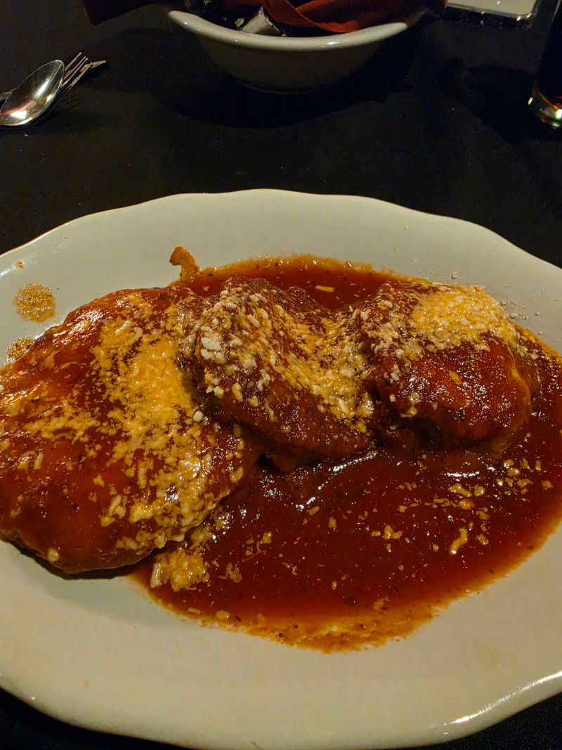 Chicken Parm Lovers May Never Glance At The Steak Menu