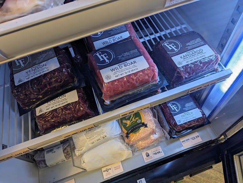 Ground Kangaroo And Ostrich In The Freezer Case
