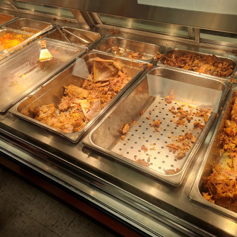Carnitas, Enchiladas And A Plate Full Of Sides