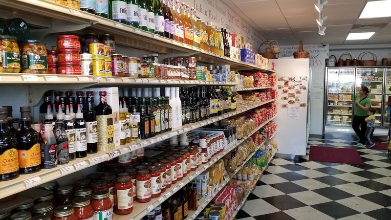This Connecticut Italian Market Makes Fresh Mozzarella, Sausage And Pasta Using Old-World Family Traditions - Decor Hint Imported Goods Fill Shelves Beyond The Deli Counter