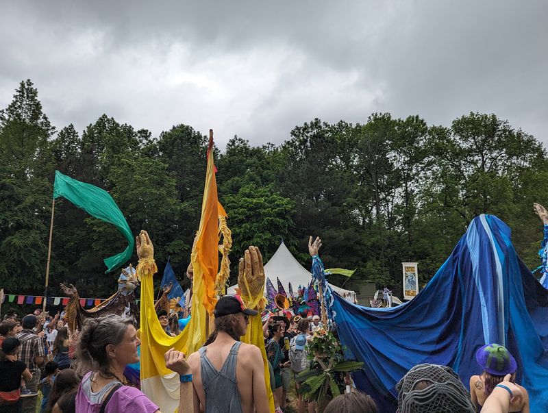 Watch A Giant Puppet Parade Wind Its Way Through The Festival