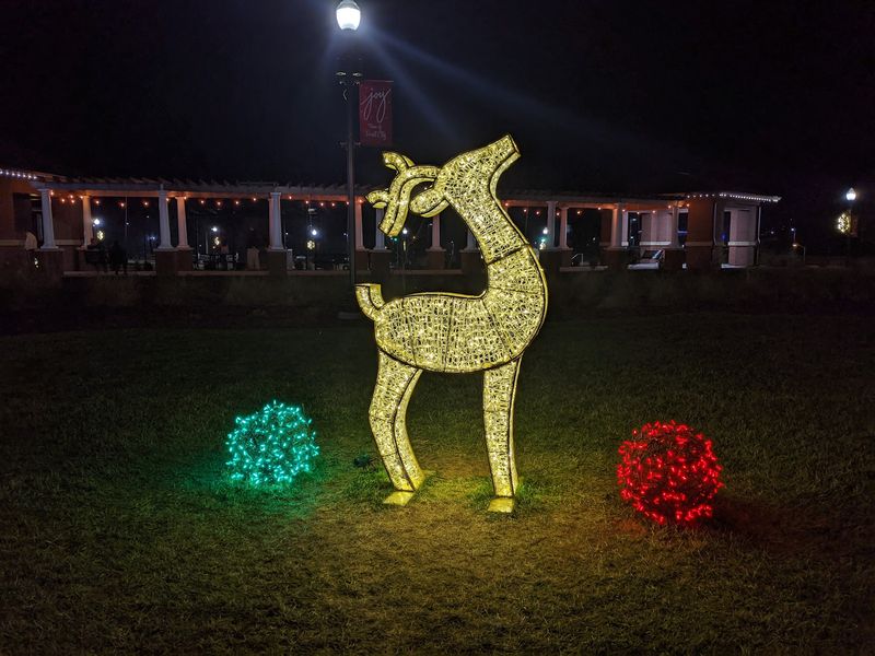 This North Carolina Town Turns Its Downtown Into A Free Christmas Wonderland With Over One Million Lights - Decor Hint Santa Keeps A Spot On The Stage At POPS