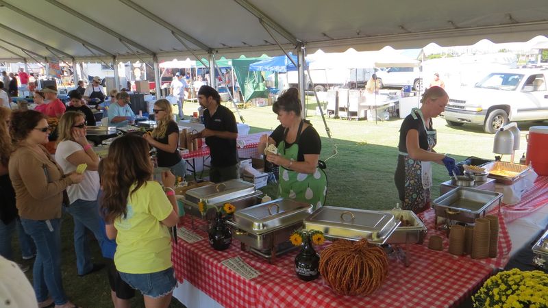 Try Your Hand At The Mullet Toss Between Trips To The Food Tents