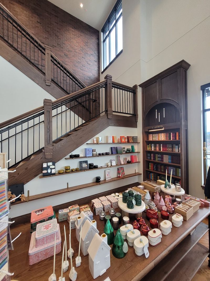 This Idaho Bookstore Has A Cozy Reading Nook Where You Sit With A Book And A Coffee Without Any Rush - Decor Hint Candles, Mugs, And Gifts Beyond The Book Stacks