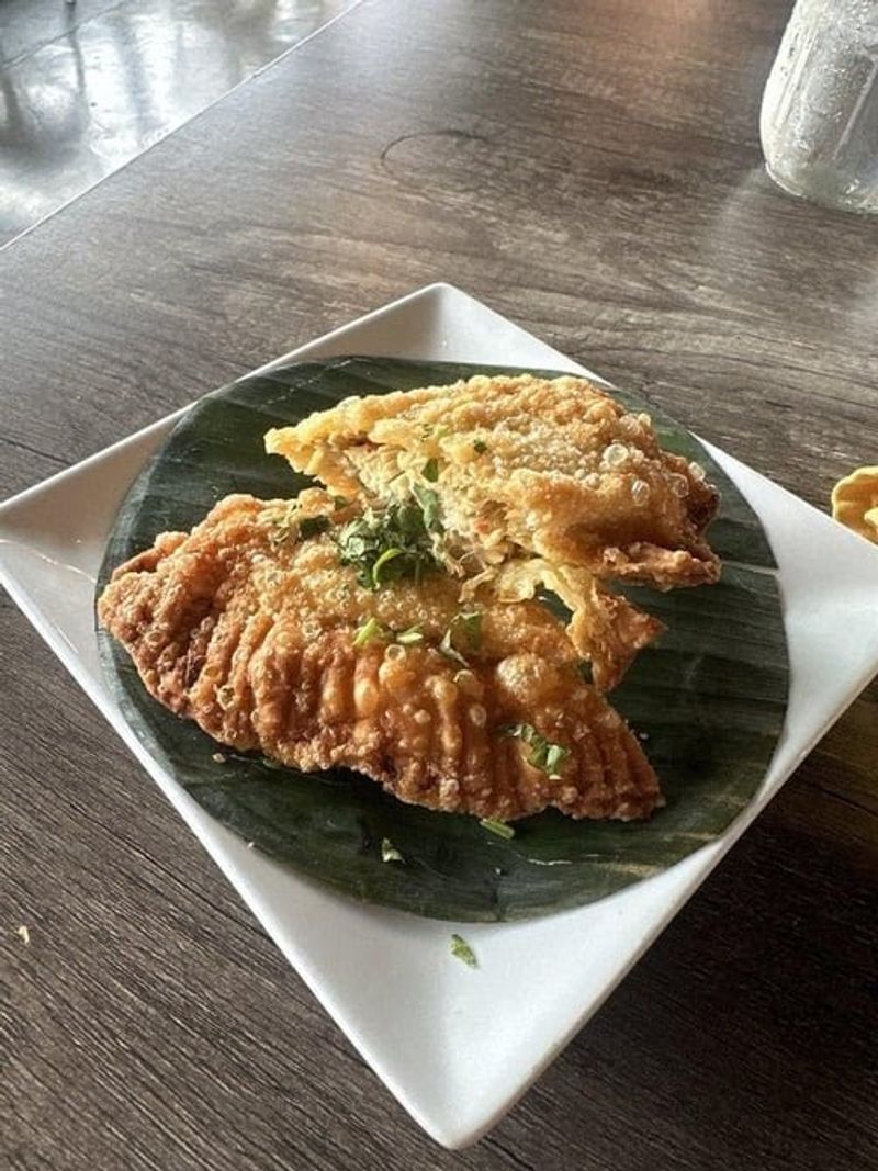 This Nebraska Puerto Rican Kitchen Serves Baked Pernil Alongside Arroz Mamposteao And Tostones - Decor Hint Fritters, Empanadillas, and the Savory Bread Basket