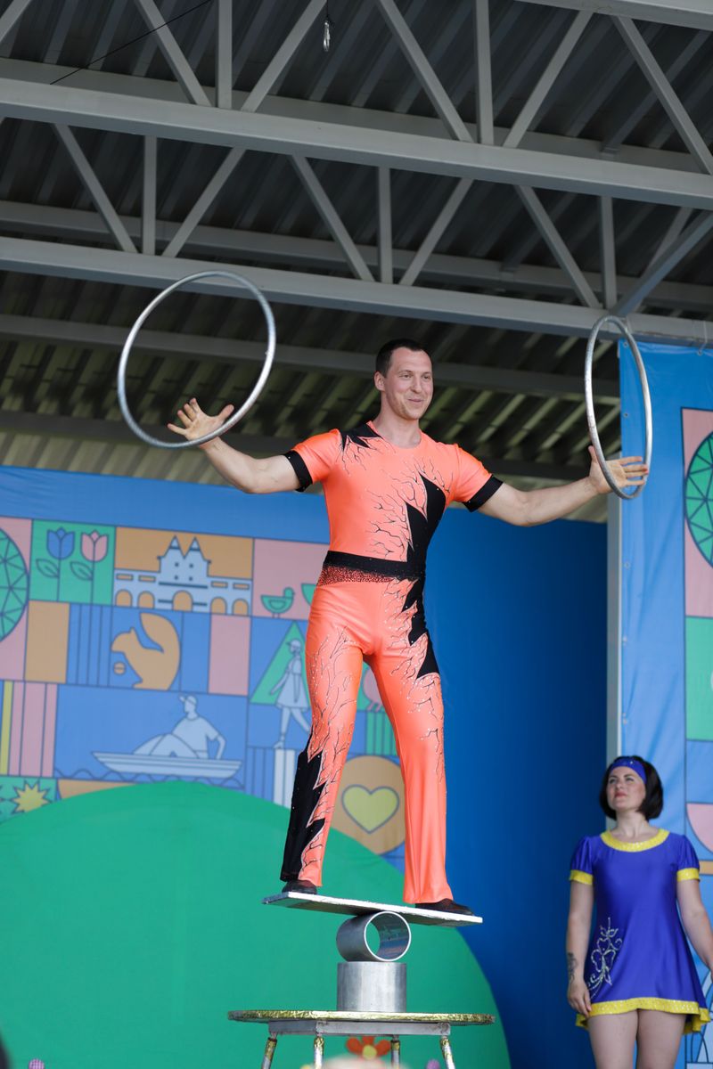 Flying Acrobats, Spinning Bikes, And A Hula Hoop Star