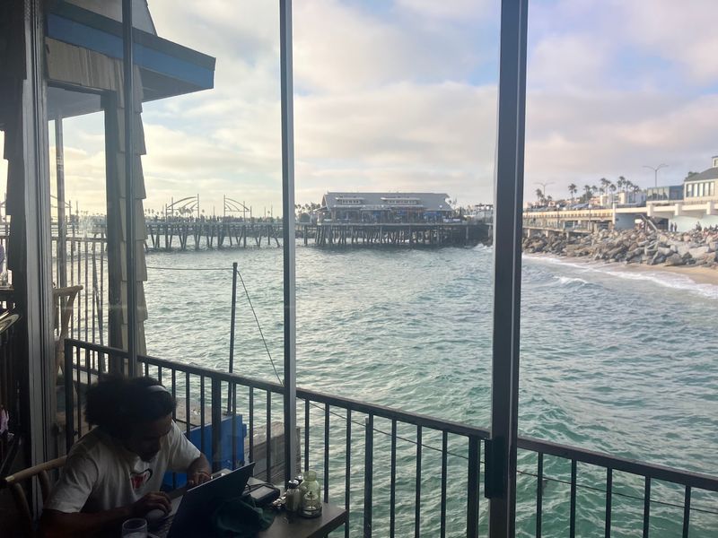 Waves Rolling Right Below The Tables