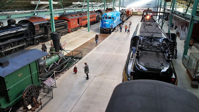A Massive Train Hall Sitting Across From Amish Farmland