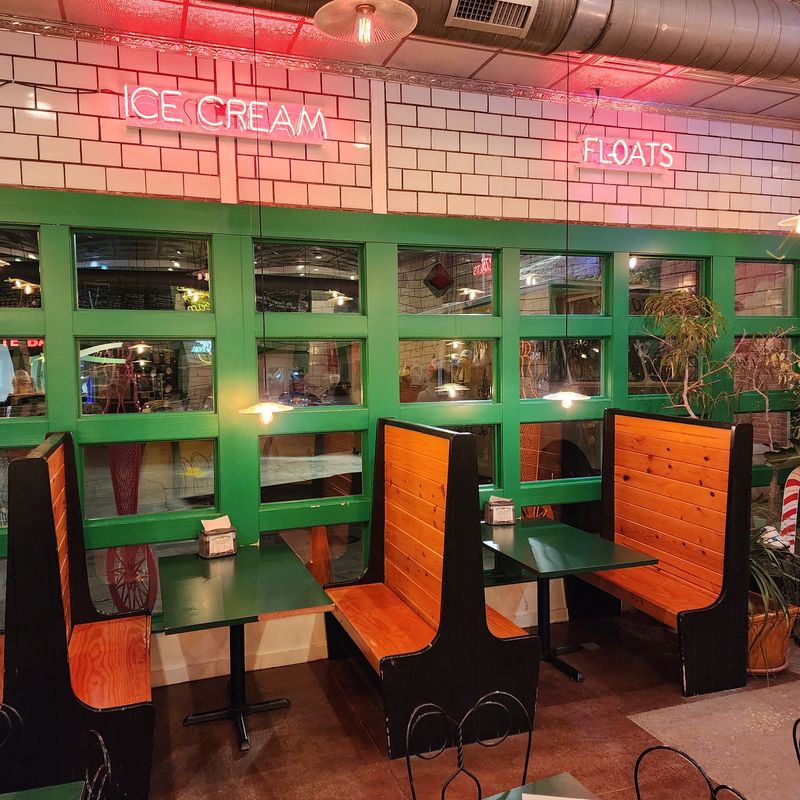 Neon Glow, Vintage Signs, And Cajun Food Under One Roof
