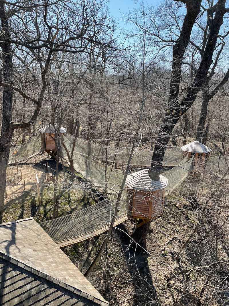Every Fall Nebraska's Oldest Apple Orchard Presses Cider From Trees Planted In The 1870s - Decor Hint Rope Bridges And Treehouses Waiting High Above The Path