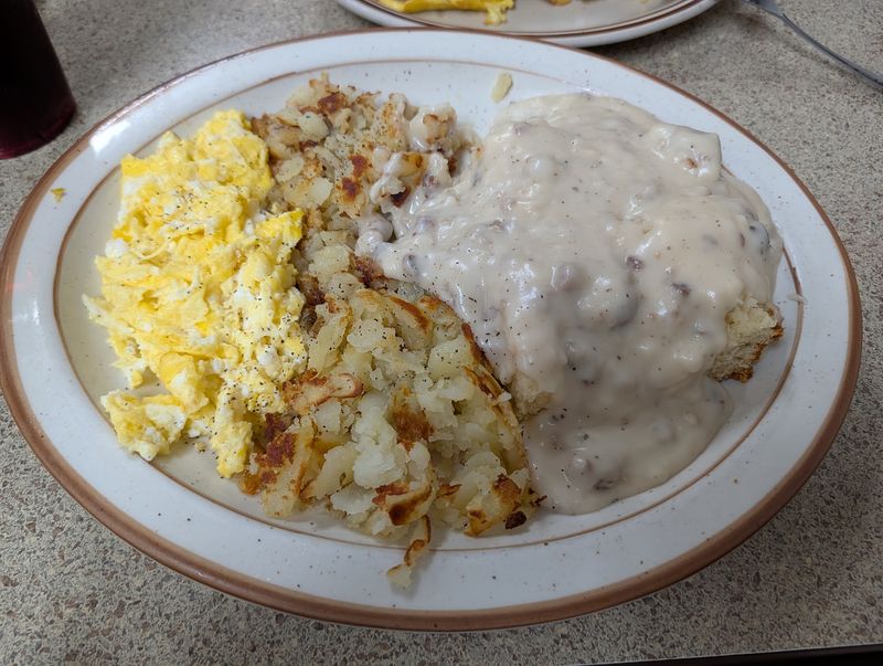 Biscuits Buried Under Thick Sausage Gravy