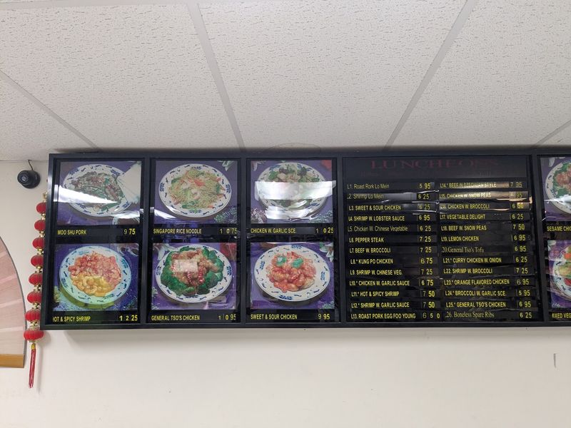A Kitchen Menu Stacked With Appetizers