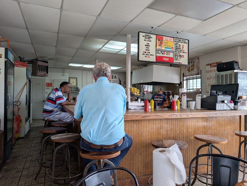 Grab A Counter Seat And Watch The Kitchen Hum