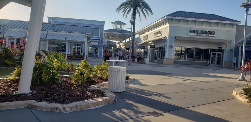 This Florida Outlet Mall Gets Your Steps In While You Hunt Brand-Name Deals, Drink In Hand - Decor Hint Your Step Counter Is About To Get Busy