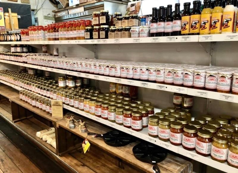 Shelves Packed With Grits, Jellies, And Sweet Surprises
