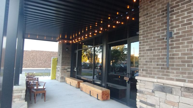 A Garage Door Turns The Dining Room Into Patio Weather