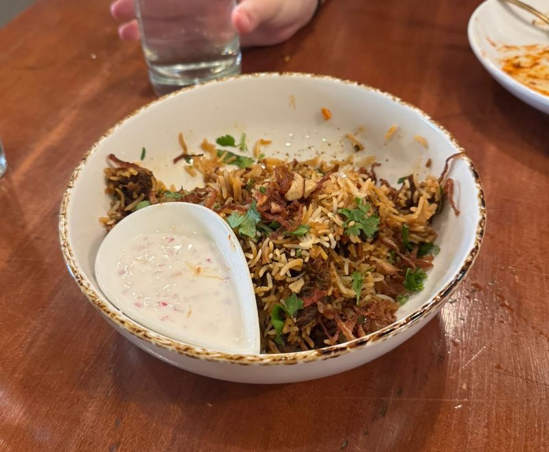 This North Carolina Indian Restaurant Just Claimed The No. 1 Spot In The Entire State - Decor Hint Big Bowls Of Rice Steal The Spotlight
