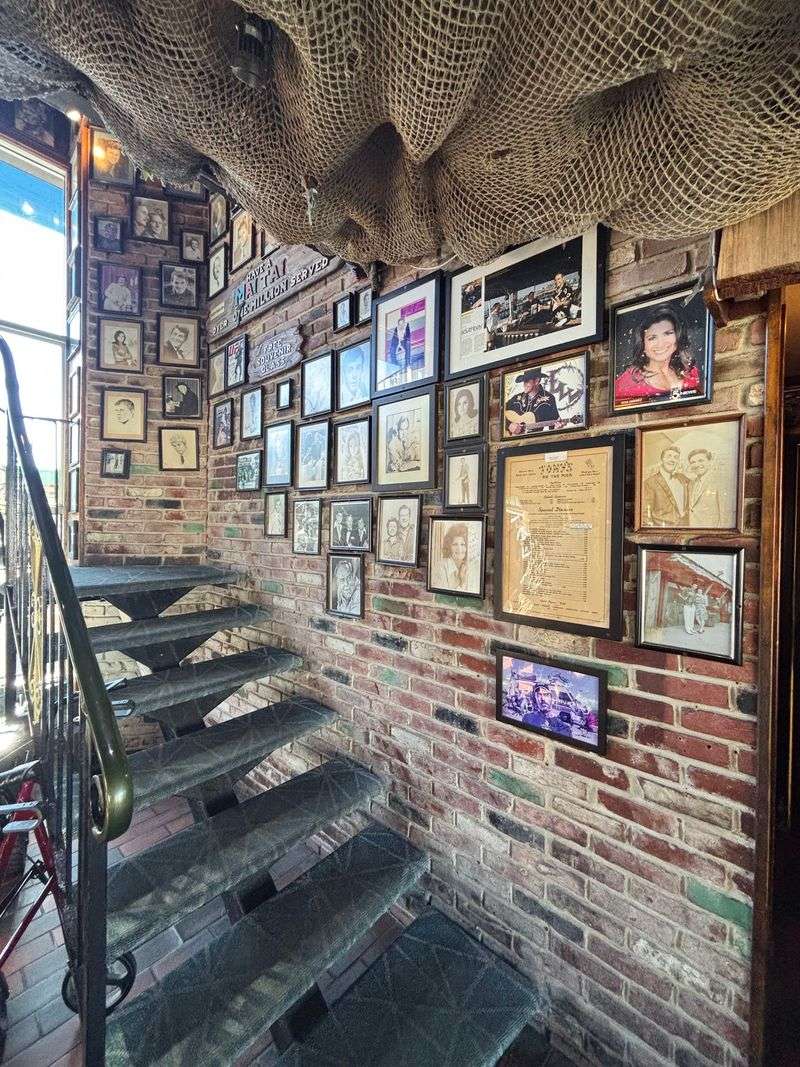 Celebrity Photos Line The Way Upstairs