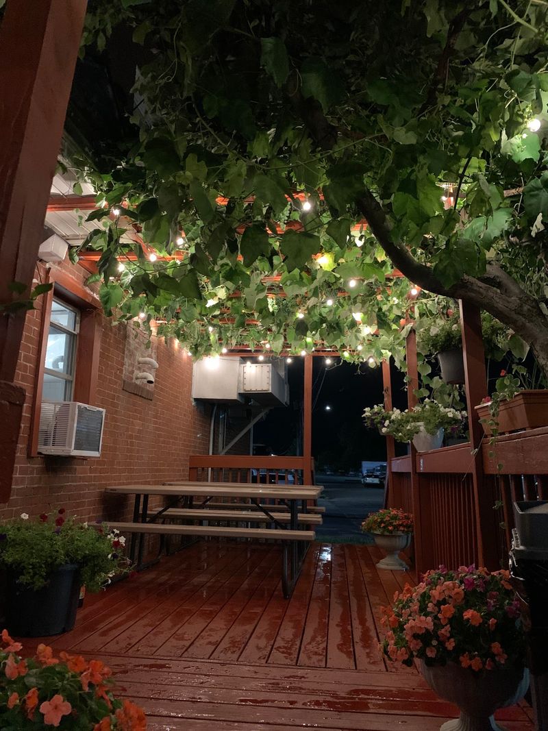 Twinkle Lights And Umbrellas Make The Patio A Summer Favorite