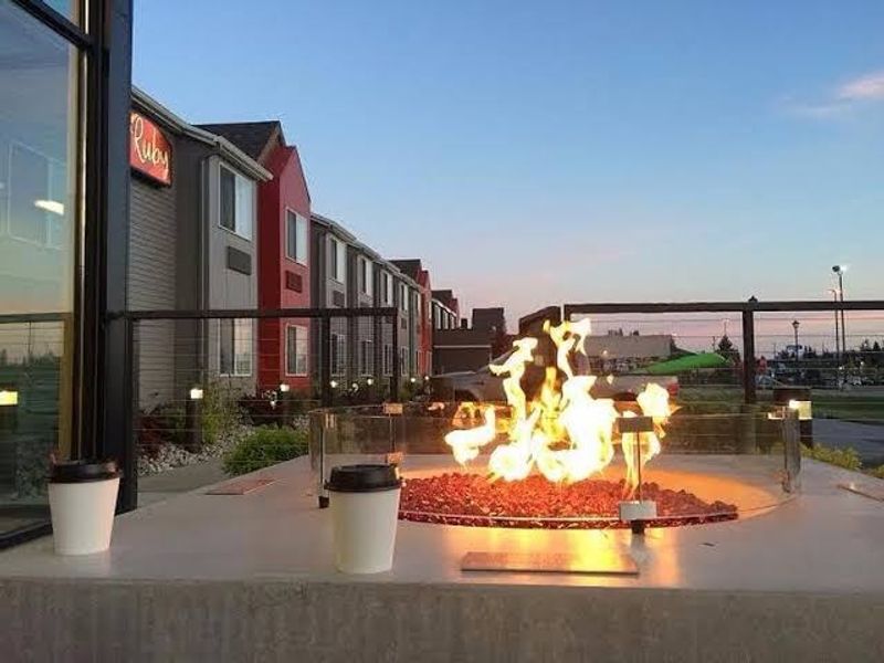 This Made-Over North Idaho Motel Now Has Fire Pits, A Pond Path, And Its Own Dog Run - Decor Hint Evenings Belong To The Fire Pits And The Lit Pond Path
