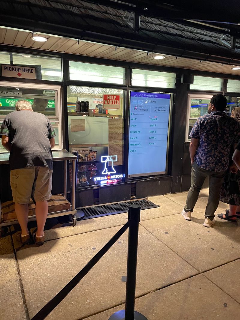 Cheesesteaks Come Out Wrapped In Paper At This Old Pennsylvania Corner Shop That Never Changed Its Grill - Decor Hint Two Windows, One Screen, And Your Name Over The Speaker