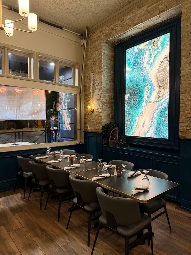 Butterflies, Stone, And Tropical Color Gave The Dining Room A Glow-Up