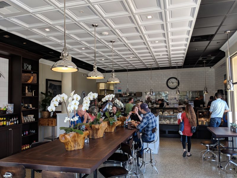 This Award-Winning California Meat Market Is The Ultimate Stock-Up Stop In 2026 - Decor Hint Grab A Seat At The Big Wooden Table