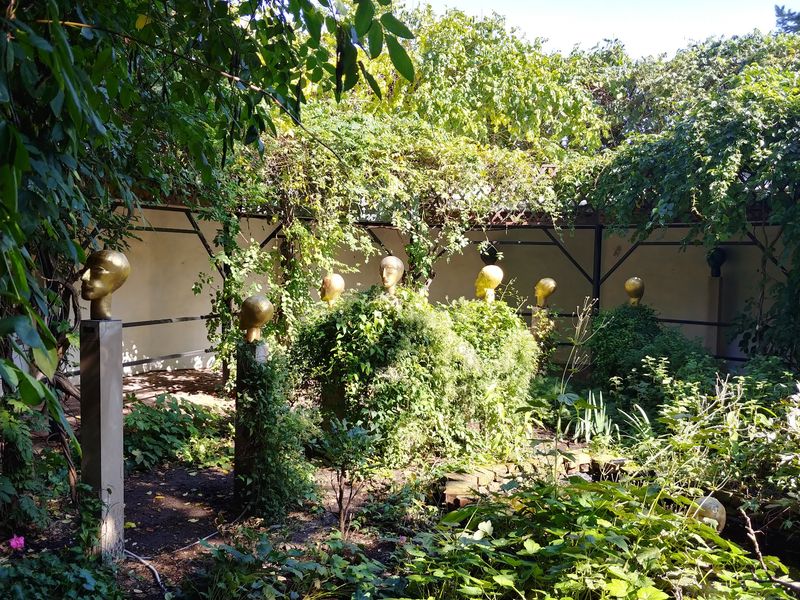 Flowers Along the Rooflines of Covered Sidewalks