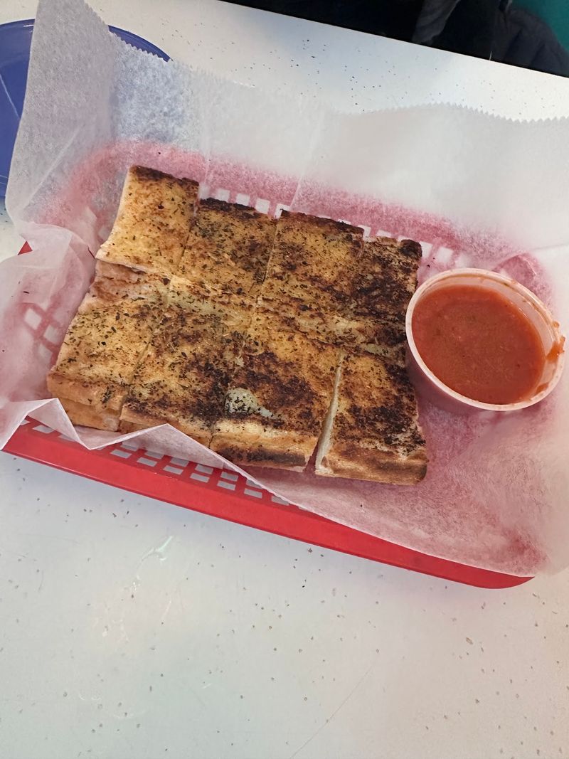 An Illinois Pizzeria Serves Cracker-Thin Tavern Squares So Crispy Locals Fight For The Corner Pieces - Decor Hint Italian Beef Shows Up In More Ways Than One