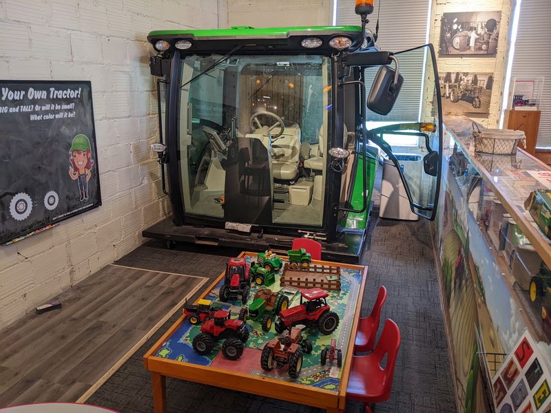 A Play Area and a John Deere Cab for Little Farmers