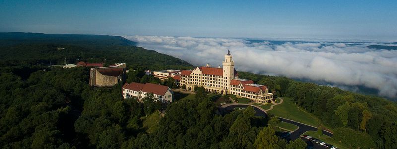 A Castle Perched Above The Clouds