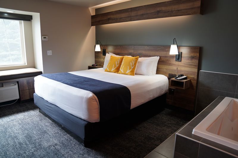 This Made-Over North Idaho Motel Now Has Fire Pits, A Pond Path, And Its Own Dog Run - Decor Hint A Comfy Home Base Right Where Sandpoint Meets Ponderay