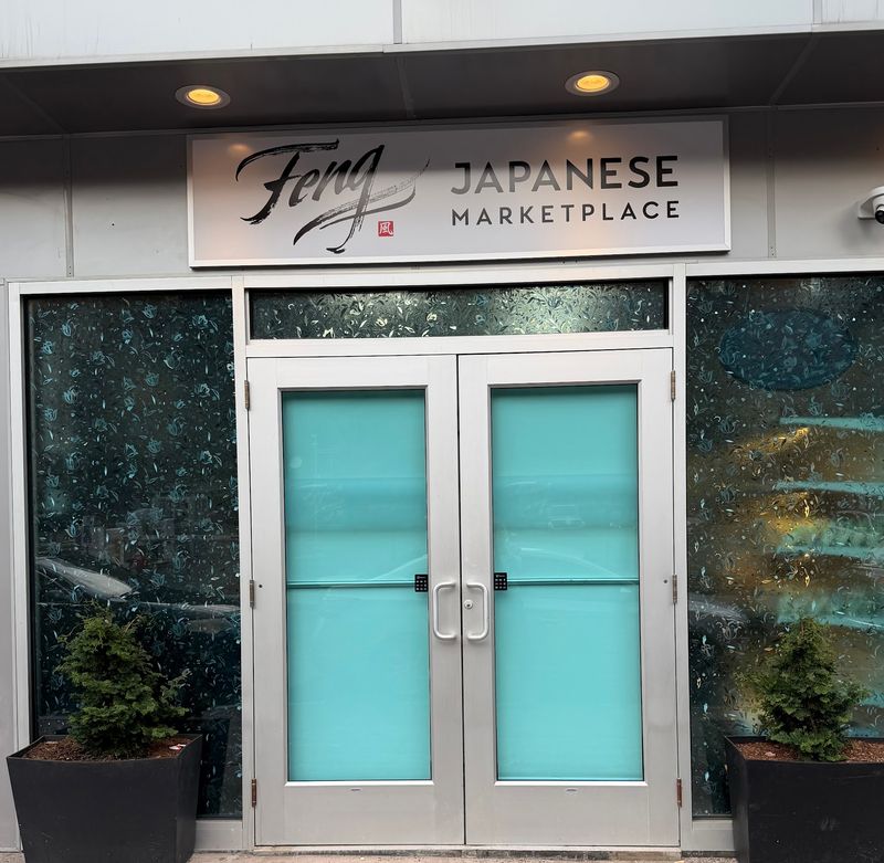 A Downtown Market With A Fancy Kitchen Right Next Door