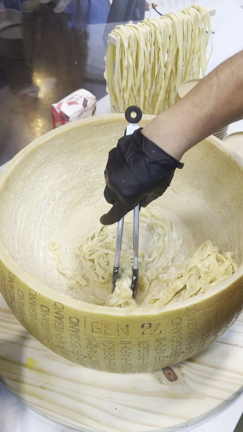 The Cheese Wheel Toss Is The Main Event, And You Get A Front-Row Seat
