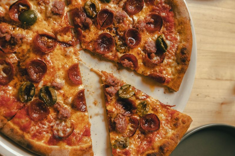 The Adventurist Says A Michelin Bib Gourmand Would Make Sense At This Michigan Pizza And Pasta Spot - Decor Hint Wood-Fired Pizzas With A Little Personality