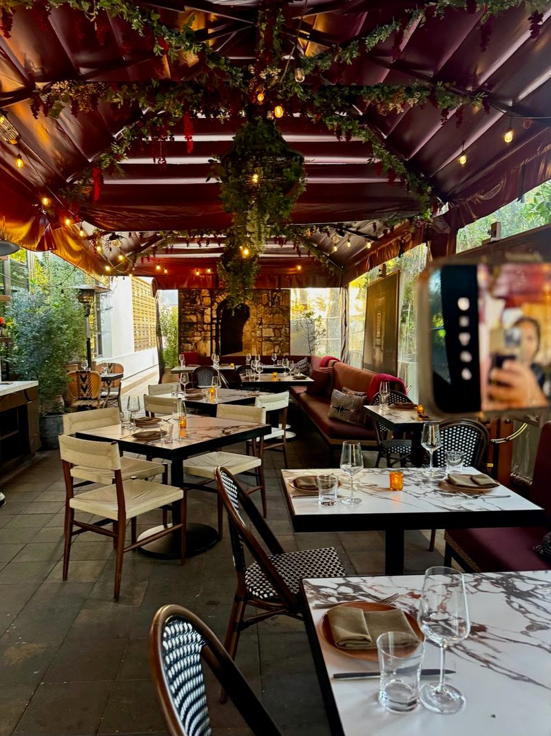 The Patio Brings Sofas, Greenery, And Heaters