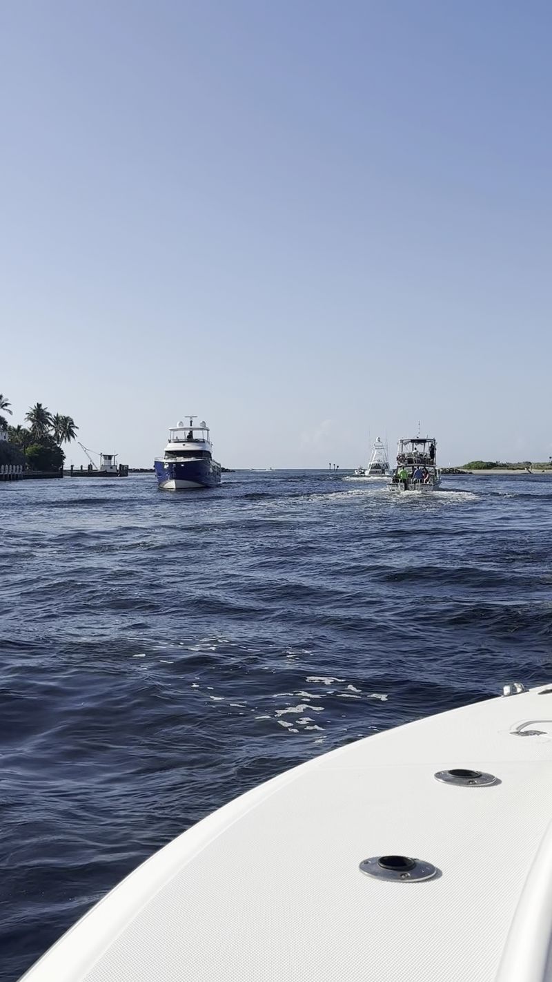 A Steady Parade Of Boats Heading To Sea