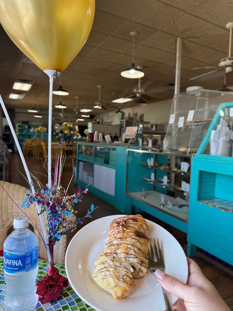 This Old-School Tennessee German Bakery And Deli Keeps Authentic Flavors Alive - Decor Hint An Old Warehouse With Two Very Different Doors