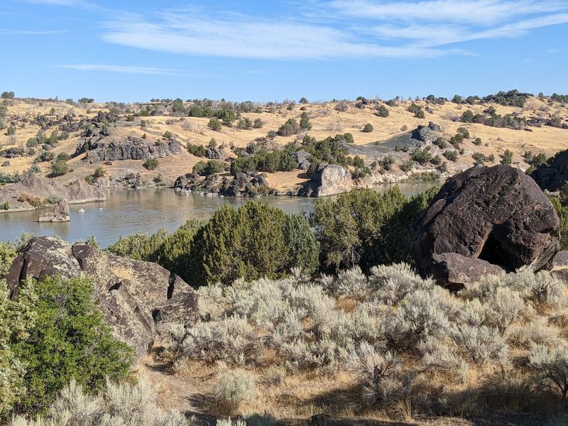 Visitors Hike Past Pioneer Tracks Pressed Into Rock At This Idaho Spot Near The Snake River - Decor Hint The Boulder Pioneers Used As A Guest Book