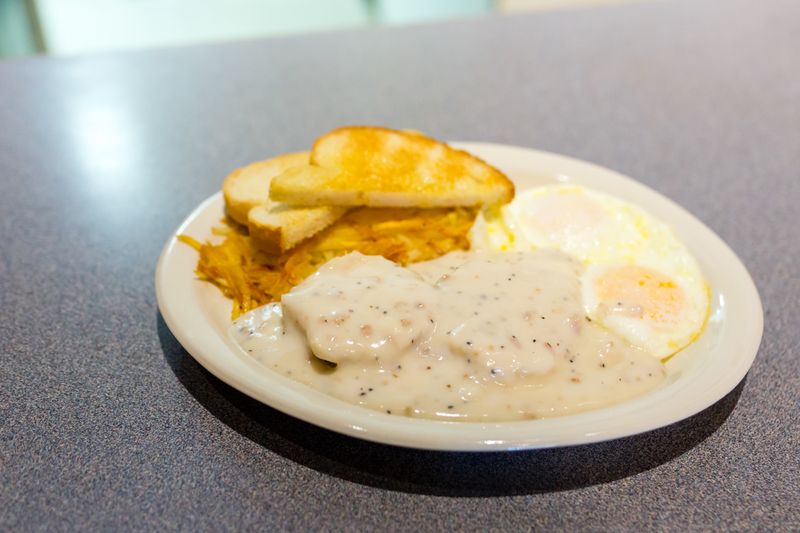 Biscuits Buried In Peppery Sausage Gravy