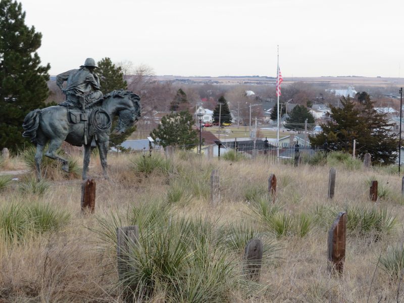 The Statue Standing Watch Over The Hill