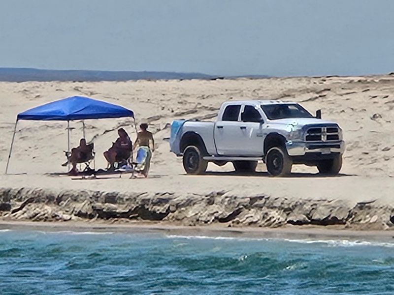 Driving Right Onto the White Sand