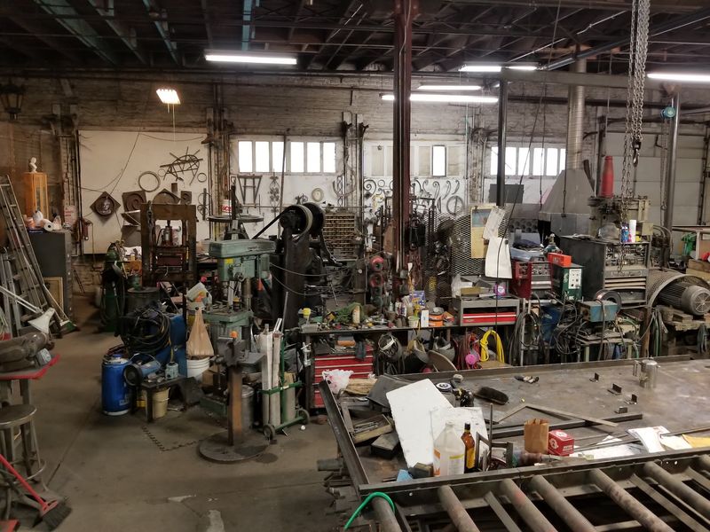 Bronze, Clay, And Blacksmith Sparks Down The Hall