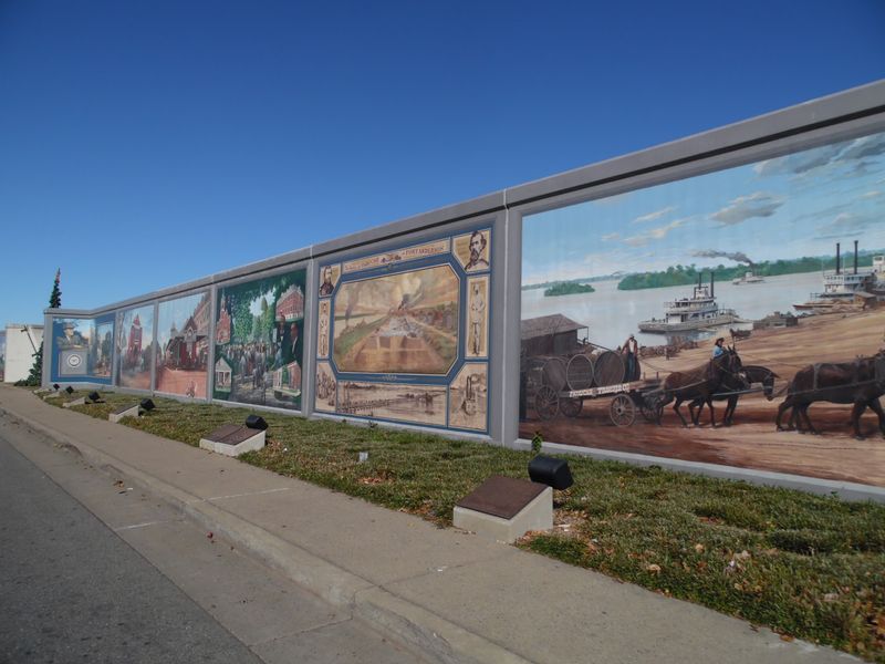 A Floodwall Became The Town's Biggest Art Gallery