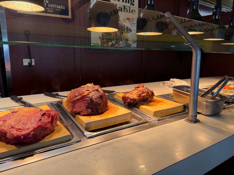 Prime Rib Gets Carved Thick Under A Heat Lamp At This Florida Buffet Every Single Night