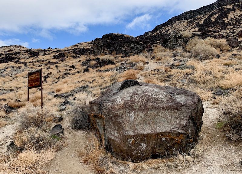 Visitors Walk Among Thousands Of Petroglyphs Carved Along This Idaho Canyon Rim
