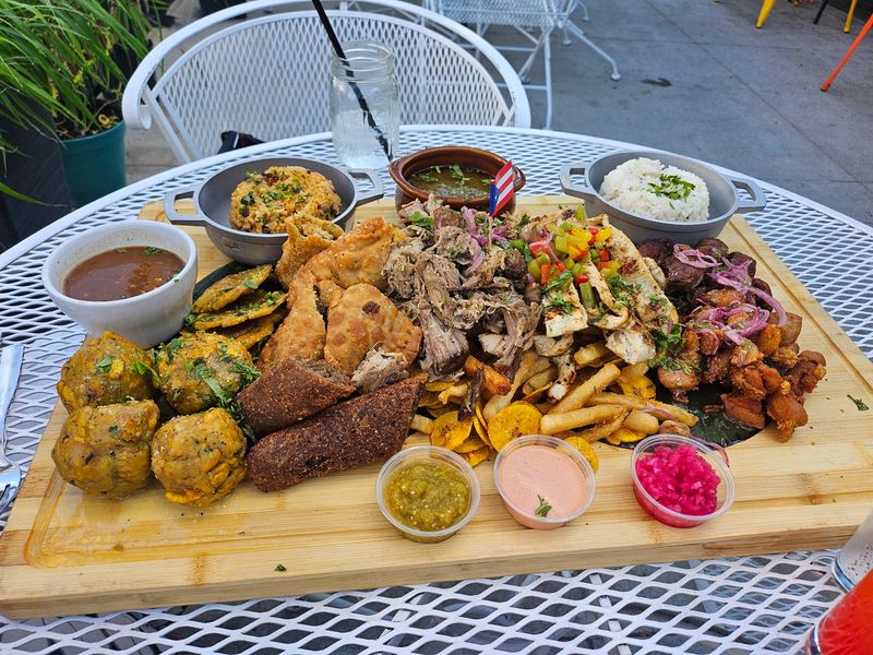 This Nebraska Puerto Rican Kitchen Serves Baked Pernil Alongside Arroz Mamposteao And Tostones